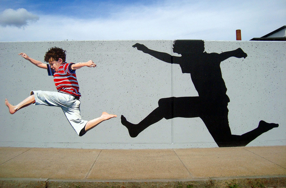 Woonsocket Kids Mural Painted on Retaining Walls by Bonnie Lee Turner and Charles C. Clear III of The Art Of Life