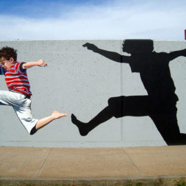 Woonsocket Kids Mural Painted on Retaining Walls by Bonnie Lee Turner and Charles C. Clear III of The Art Of Life